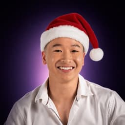 Benjamin Chua wearing a Santa hat